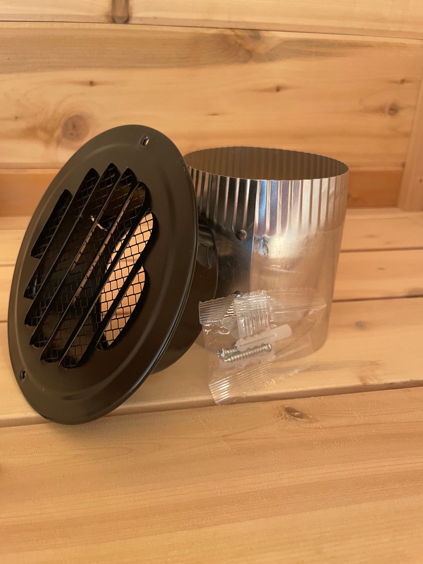 INTERIOR AND EXTERIOR SAUNA VENT COVER COMBINATION